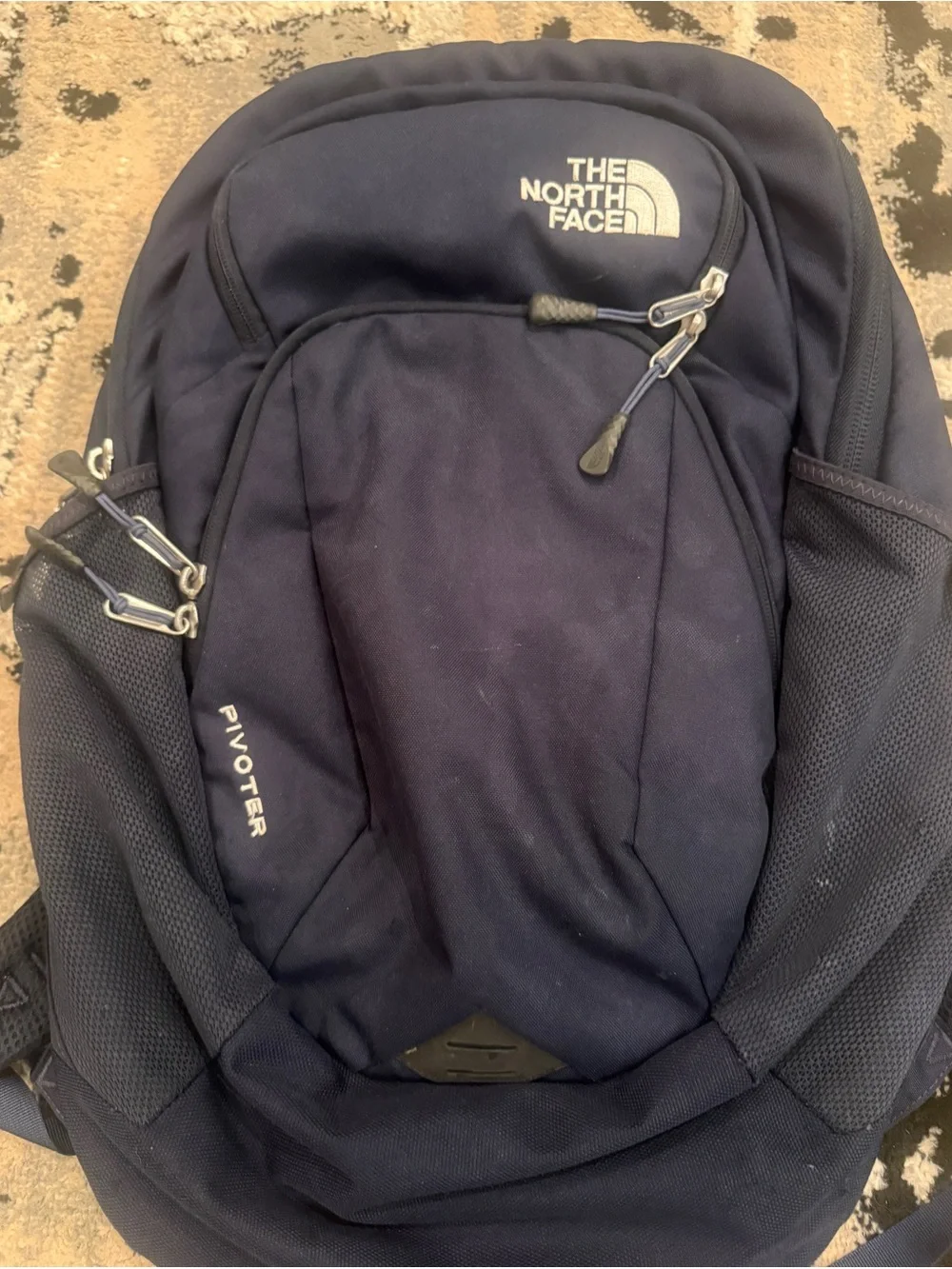 The North Face (Pivioter) Dark Blue Backpack with White Logo